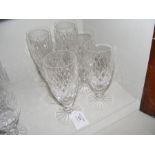 A set of six Waterford Crystal champagne flutes