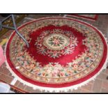 A floral circular rug - diameter 165cms