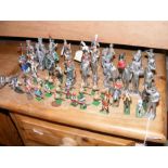 A quantity of miniature lead military figures