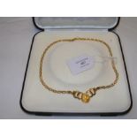 A ladies 18ct gold necklace in presentation case