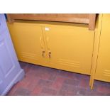 A contemporary Mustard Made Lowdown Storage Locker