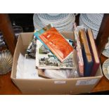 A box of stamps and postcards