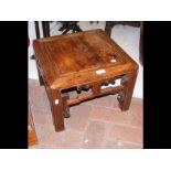A small square Chinese hardwood occasional table -