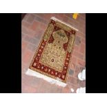 A silk Hereke rug with knot density of 11 x 11 squ