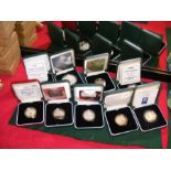 Nine boxed commemorative coins with certificate