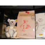 A modern Steiff teddy bear with original box