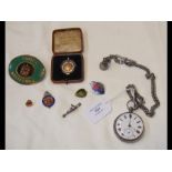 A silver cased pocket watch and chain together wit