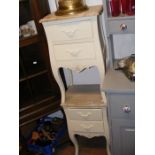 A pair of French style bedside cabinets