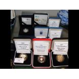 Eight boxed commemorative silver proof coins, toge