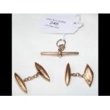 A pair of gents 9ct gold cufflinks together with a