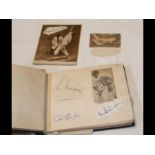 An autograph book containing famous cricketers