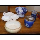 A blue and white Wedgwood biscuit barrel and cover