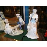 A Lladro figural group of boy and girl on seesaw -