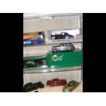 Seven die cast model vehicles, including a Revell