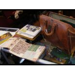 Various stamp albums contained in a leather case -