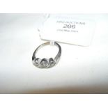 A three stone diamond ring in platinum setting