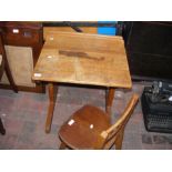An old school desk with chair