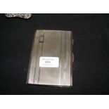 A silver cigarette case 12cm x 9cm