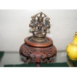 A small bronze Indian deity figure - 9.5cm high -