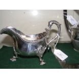 A heavy silver sauce boat by the Goldsmiths & Silv