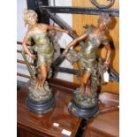 A pair of hand painted French Spelter figures of m