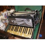 A Soprani Settimio accordion in case