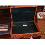 A Louis Vuitton leather briefcase