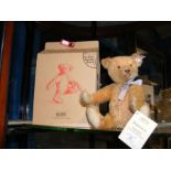 A modern Steiff teddy bear with original box