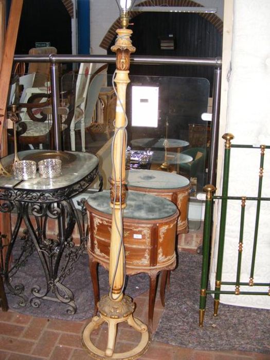A pair of French style oval bedside tables, togeth