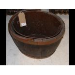 A metal bound wooden bucket