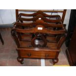 A Victorian rosewood Canterbury with drawer to the