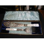 A silver and mother of pearl cased set of fish ser
