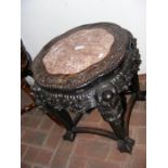 An antique Chinese hardwood plant stand with marbl