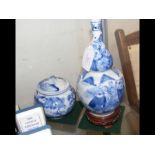 An antique Chinese blue and white gourd vase with