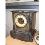 A Victorian slate mantel clock