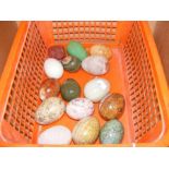 A quantity of decorative stone eggs, etc.