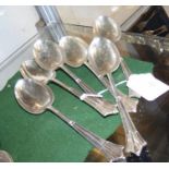 The matching six silver dessert spoons