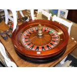 A circa 1970s full size 32" diameter casino roulette wheel