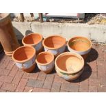 Six terracotta pots