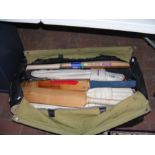 A quantity of vintage cricket equipment (bats and