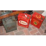 A vintage Esso fuel can and two others