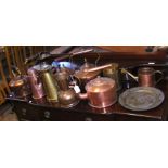 A quantity of brass and copper metal ware - mostly