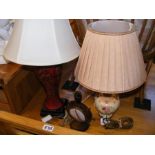 Three table lamps of varying shape and size
