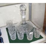 A Waterford cut glass decanter with matching six g