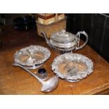 A pair of wine bottle stands, silver spoons etc.