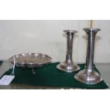 A pair of silver candlesticks, together with a pie