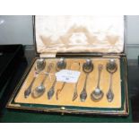 A set of silver Art Nouveau style tea spoons with