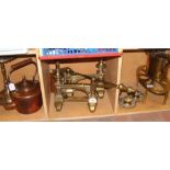 A brass fireside set, together with copper kettle,