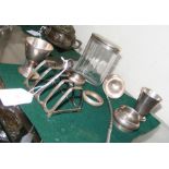 A silver toast rack together with napkin rings etc