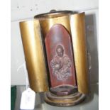 A 15.5cm high metal buddha in two door travelling
